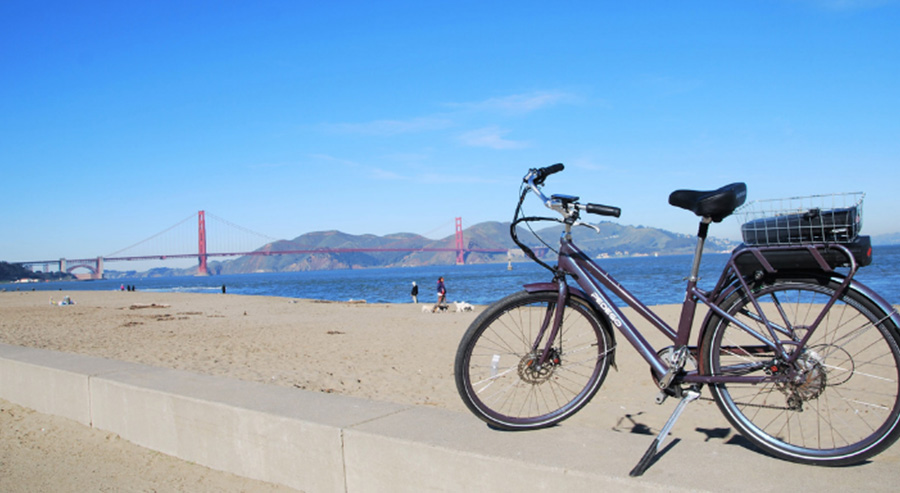 Bike on Beach Near San Francisco Waterfront with Golden Gate Bridge View